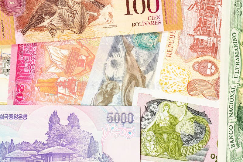 Old banknotes from different exotic countries. Colorful paper money background. Close-up macro royalty free stock photos Old banknotes from different exotic countries. Colorful paper money background. Close-up macro royalty free stock photos