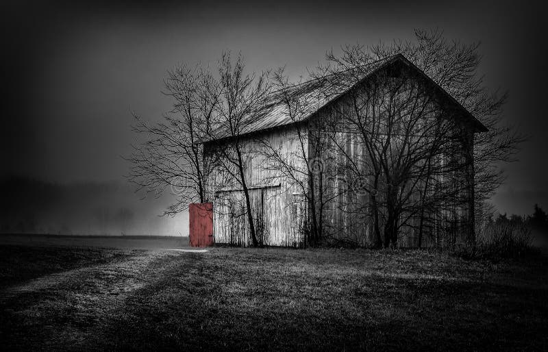 Old barn with a red door landscape