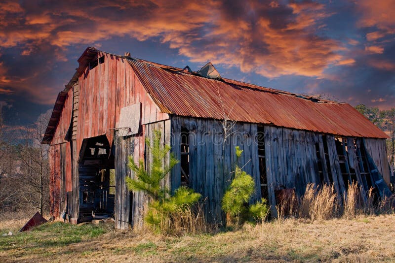 Old Barn with Rusty Roof at Dusk