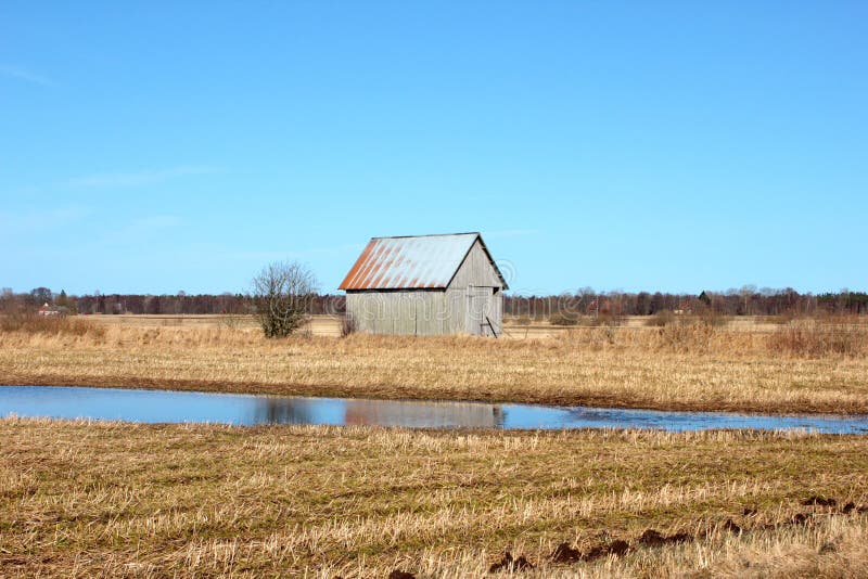 An old barn in the Swedish farming fields. An old barn in the Swedish farming fields.