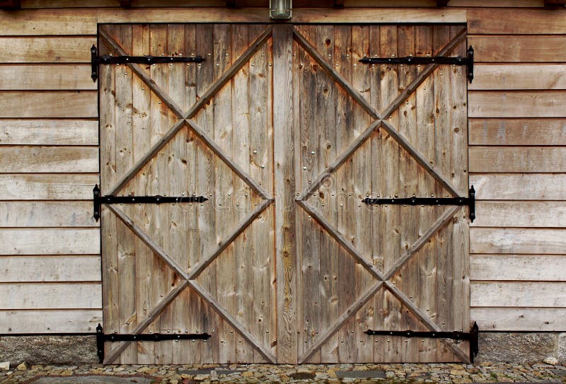 Old barn wooden door with four crosses