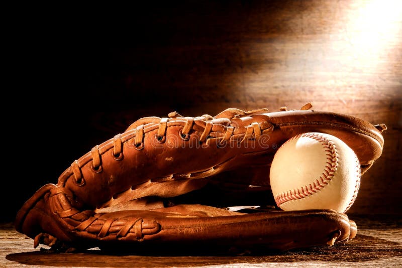 Old Baseball Glove and Ball in Nostalgic Light