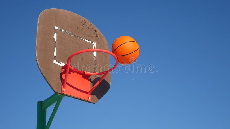 Old basketball hoop, street basketball throw the ball in the basket sport