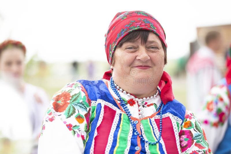 An Old Belarusian Or Ukrainian Woman In An Embroidered Shirt Slavic Elderly Woman In National