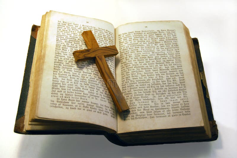 Old bible and cross stock photo