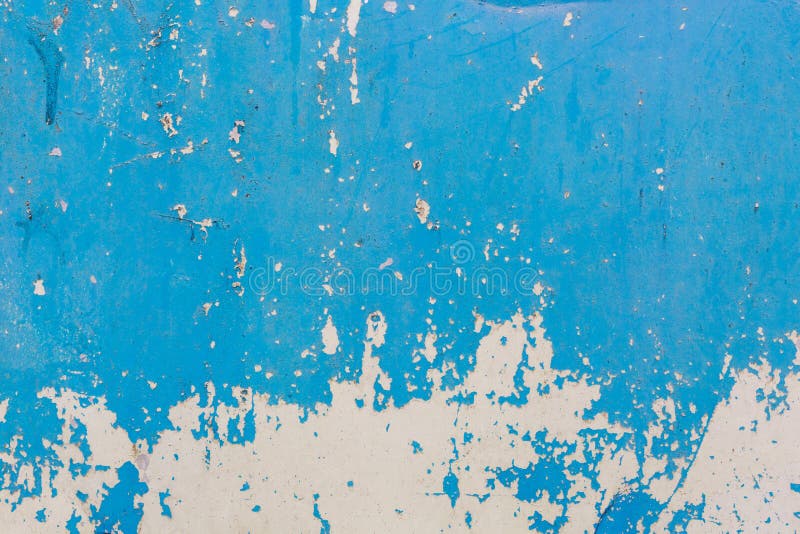 Old blue cracked paint on metal background
