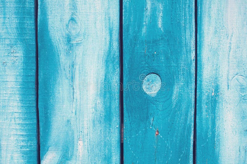 Old blue cracked wooden boards. Cracks in the tree. Fence. Texture royalty free stock photography Old blue cracked wooden boards. Cracks in the tree. Fence. Texture royalty free stock photography