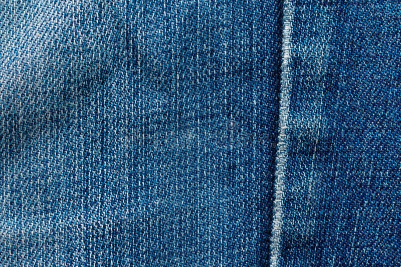 Old Blue Jeans. Denim Texture. Seam Passes through the Fabric Stock ...