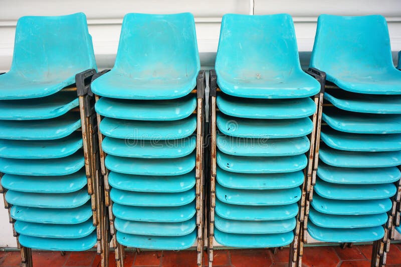 Old Blue Plastic Chairs Overlap in Vertical Stock Photo Image of