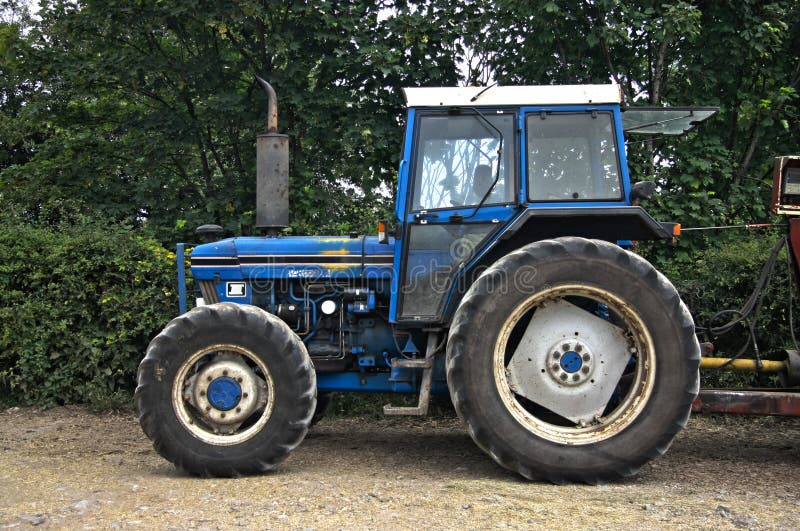Old Blue Tractor Stock Photos Download 3,158 Royalty Free Photos