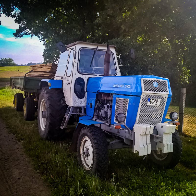 Old blue tractor editorial stock image. Image of color 168582094