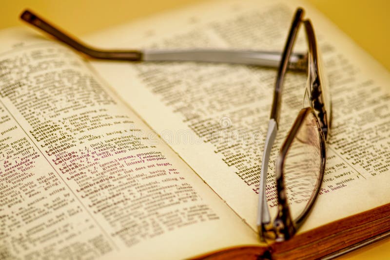 Old book and reading glasses royalty free stock photos Old book and reading glasses royalty free stock photos