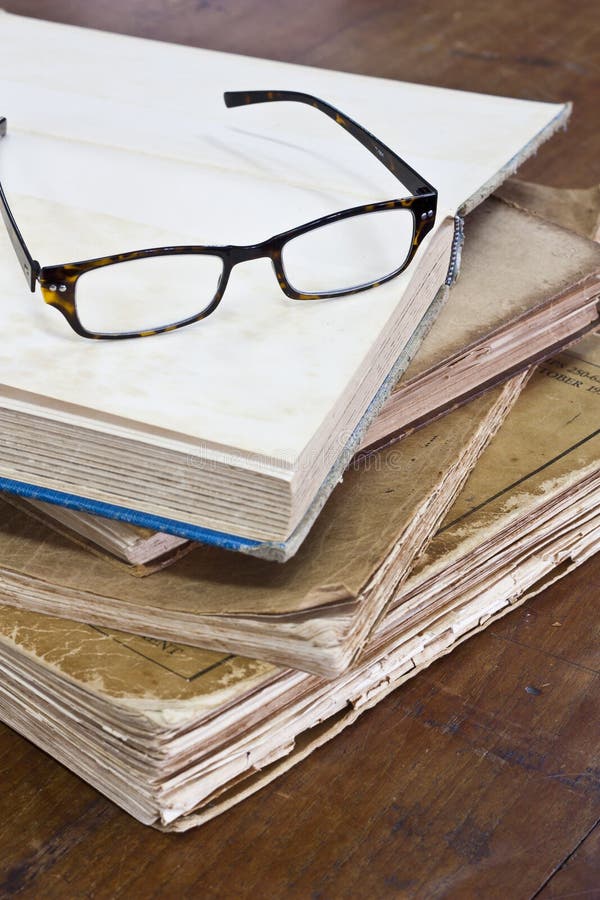 Old books and glasses