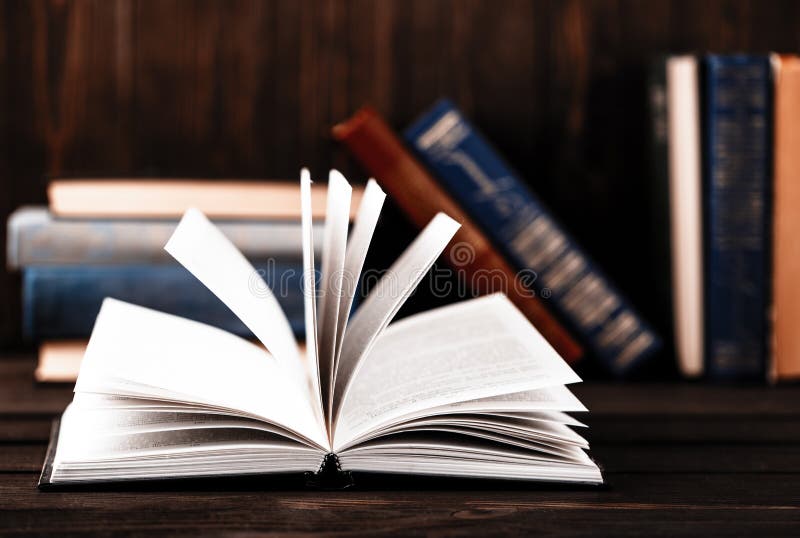 Old Books on Wooden Background. the Source of Information. Books Indoor. Home Library Stock