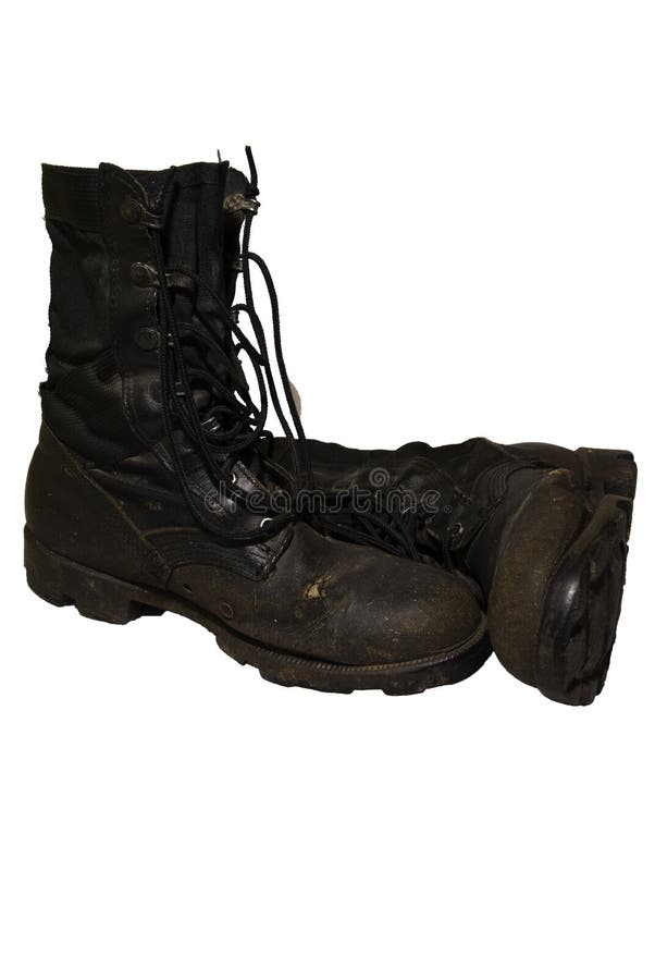 A pair of very well worn boots to the point of worn out. A pair of very well worn boots to the point of worn out.