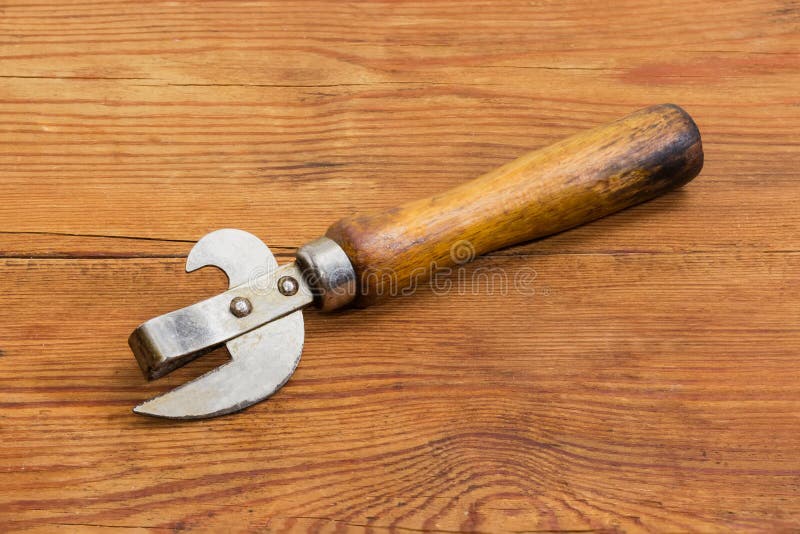 Vintage Can Opener On A White Background Stock Photo, Picture and Royalty  Free Image. Image 11250340.