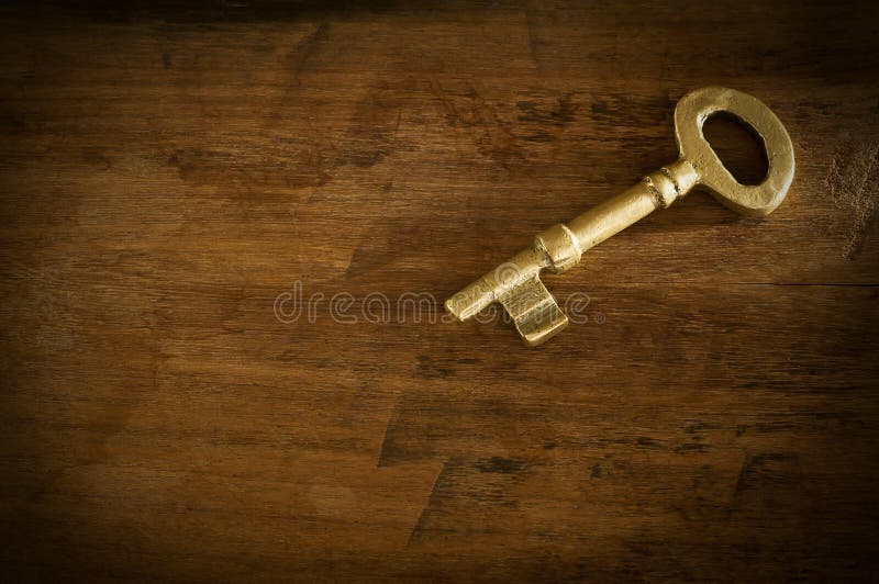 Old Brass Keys Placed On A Wooden Floor Low Key Light. Stock Image