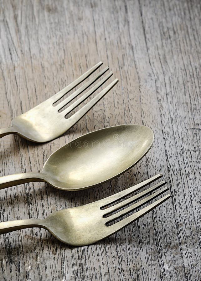 Brass spoon and fork stock image. Image of aged, vintage 54701827