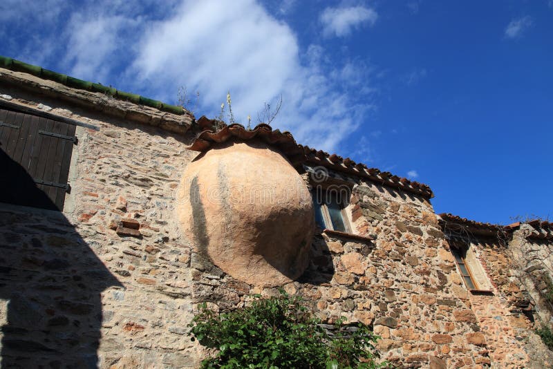 Old bread oven on Traditional house in french village of Castelnou in Pyrenees