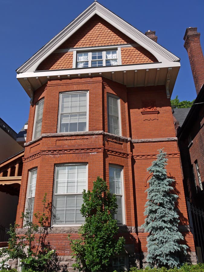 Old brick house with large gable