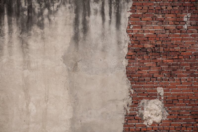 Old brick wall, half-plastered with copy space.