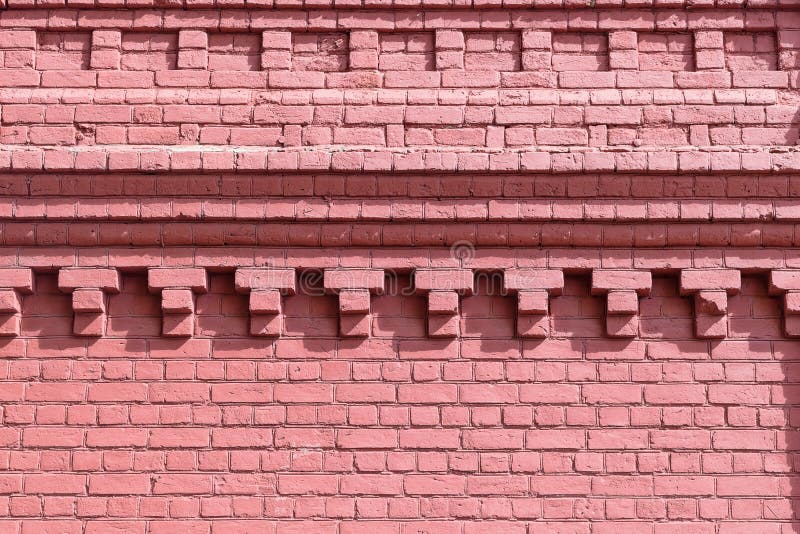 Old brick wall of red color with beautiful pattern.