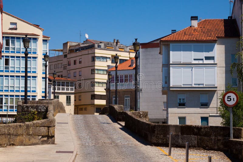 Old bridge at Monforte de Lemos in sunny day. Galicia