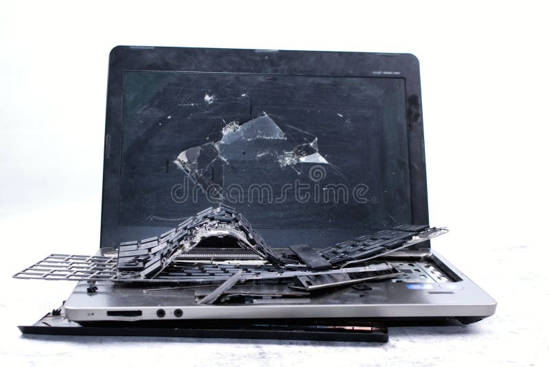 Old broken computer isolated on white background. Computers belong to electrical waste.