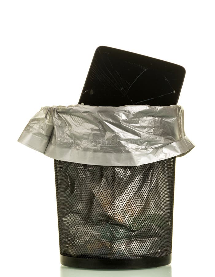 Old Broken Computer Thrown into Trash Bin, Isolated on White Stock