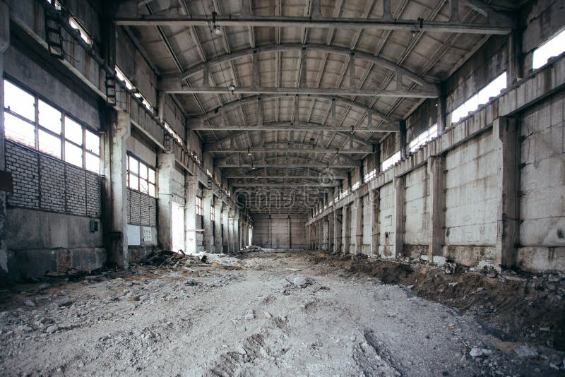 Old broken empty abandoned industrial building interior