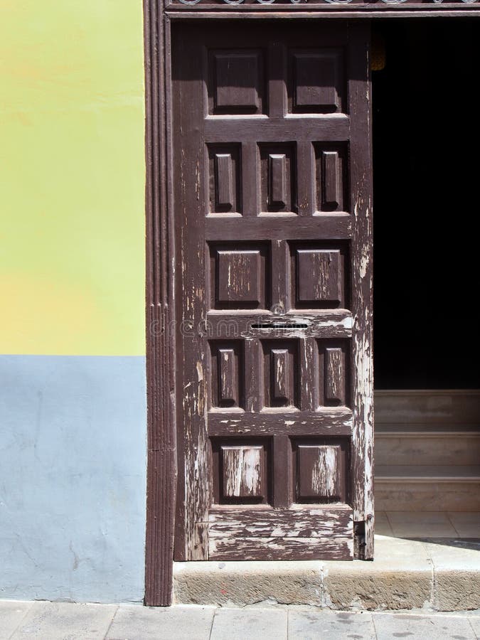 Old brown painted wooden door open with stairs inside royalty free stock images Old brown painted wooden door open with stairs inside royalty free stock images