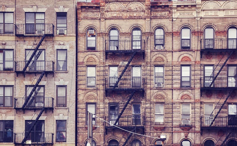 Old buildings with fire escapes in New York City.