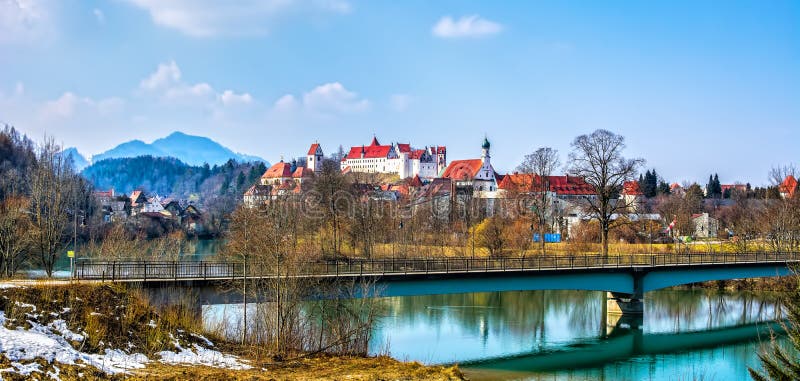 Old buildings of Fussen city. St. Mang Basilica, High Castle. Fussen, Germany. Panorama