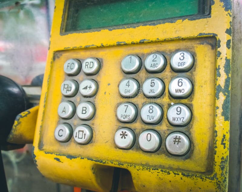 Yellow glass telephone booths with payphones are located on a pedestrian  street. Obsolete means of telephone communication in free access. Bialystok  Stock Photo - Alamy