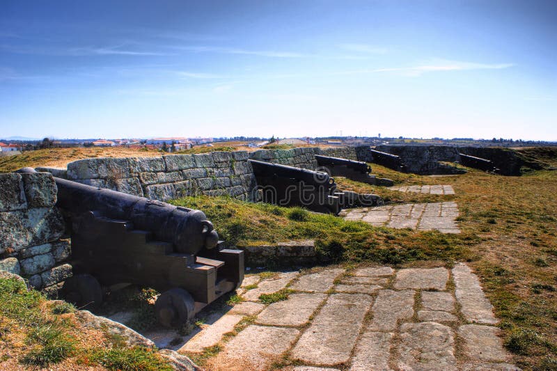 Old cannons of Almeida historical village and fortified walls stock image Old cannons of Almeida historical village and fortified walls stock image
