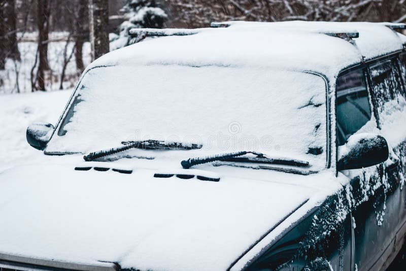 Old Car Covered with Snow, Driving in Snowy Weather Stock Image - Image