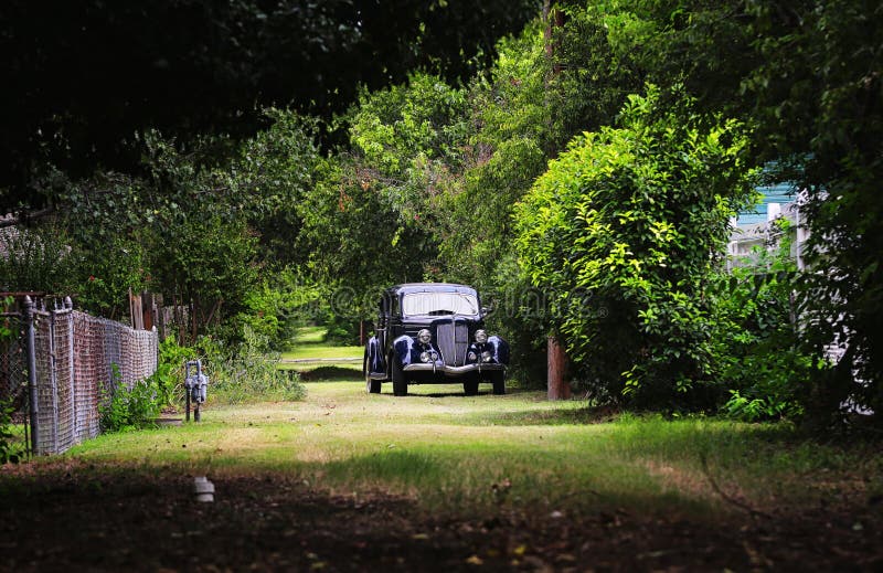 An Old car on a long road with a lonely mood