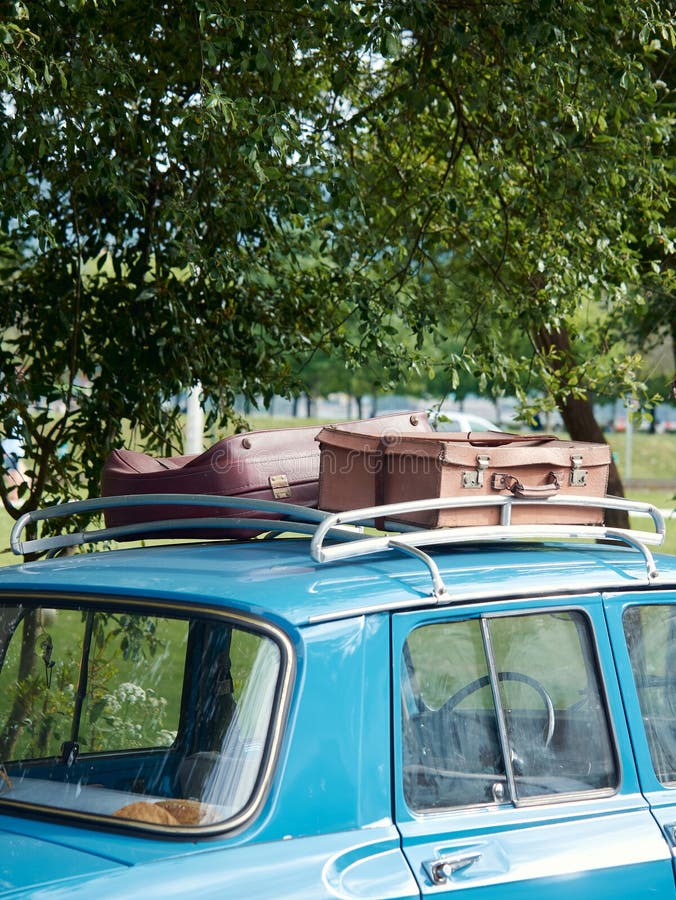 Suitcase In The Luggage Rack Of Vintage Car Stock Photo - Download