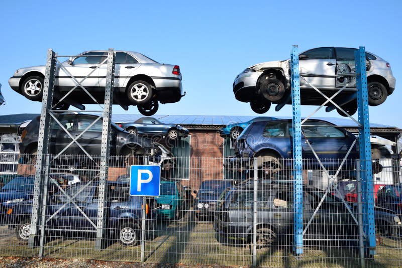 Old cars for recycling on the scrap yard 2015