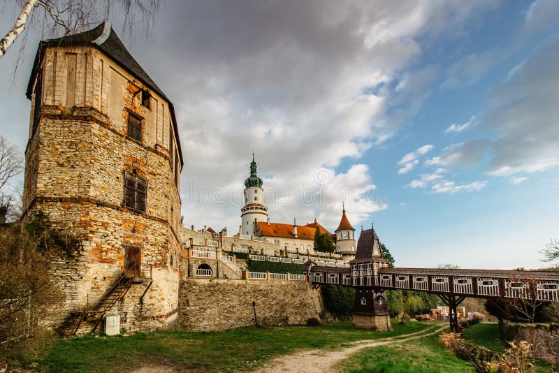 Old carved wooden Jurkovic bridge with charming castle tower in Nove Mesto nad Metuji, pearl of Eastern Bohemia, Czech Republic.