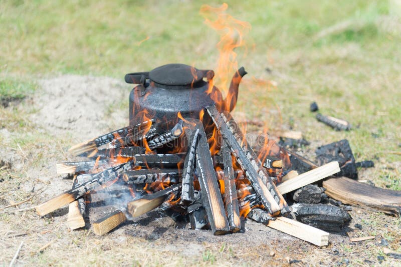 Old cattle on wood fire stock image. Image of boiling - 52684495