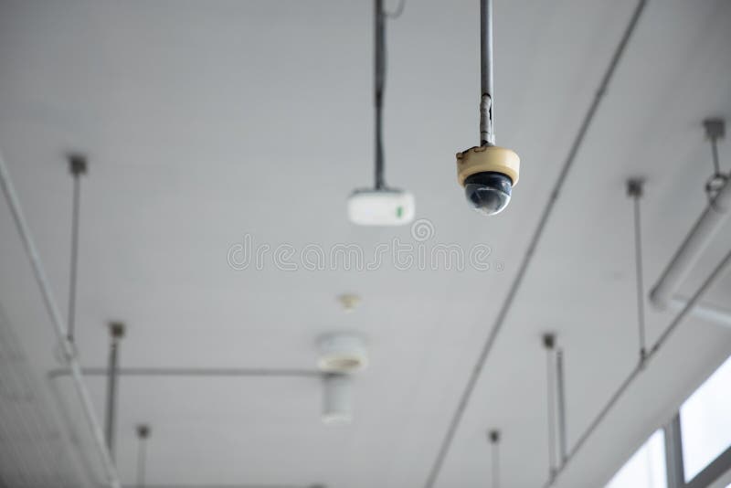 Old small CCTV camera on ceiling. Old cctv monitor stock images, royalty-free photos and pictures