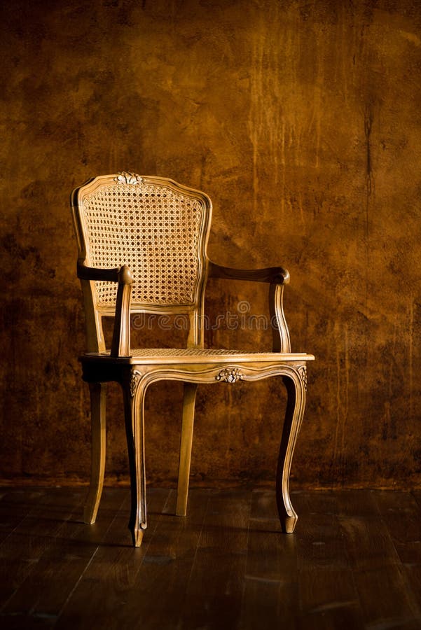 Old Chair on a Brown Wall Background. Stock Image - Image of chair,  background: 114909267
