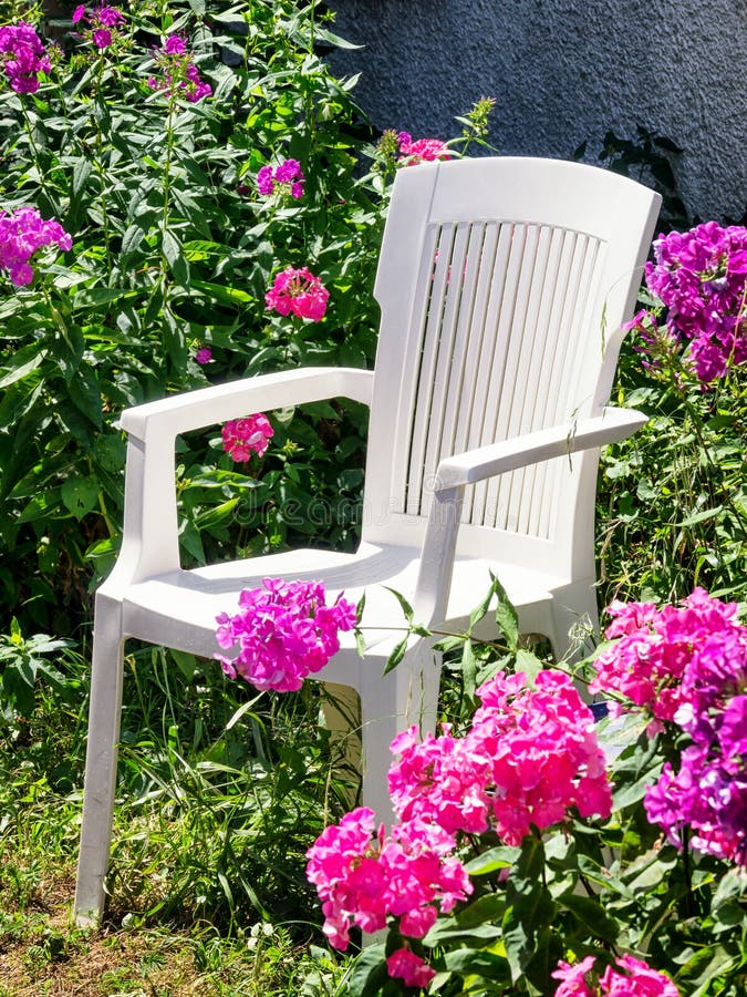 Old chair and flowers stock image. Image of group, people 50729443