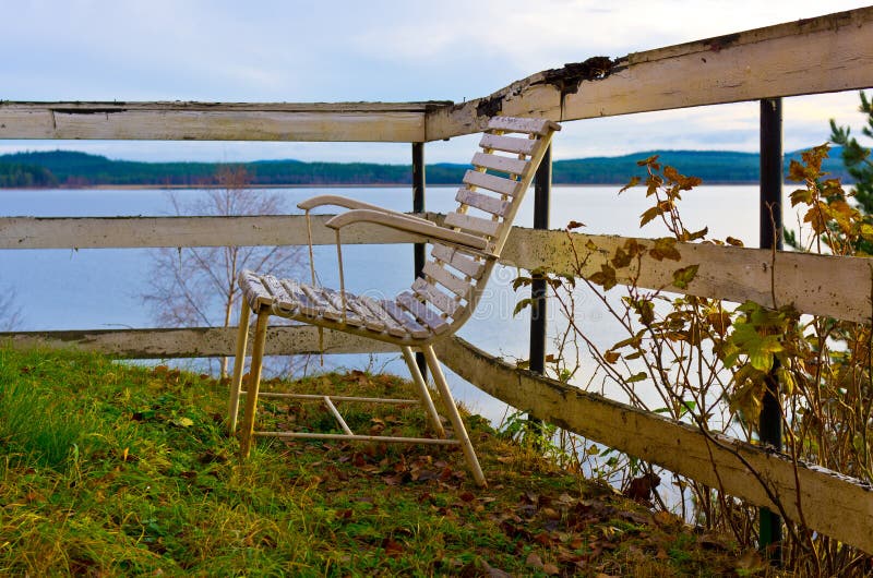 Old chair on a lake