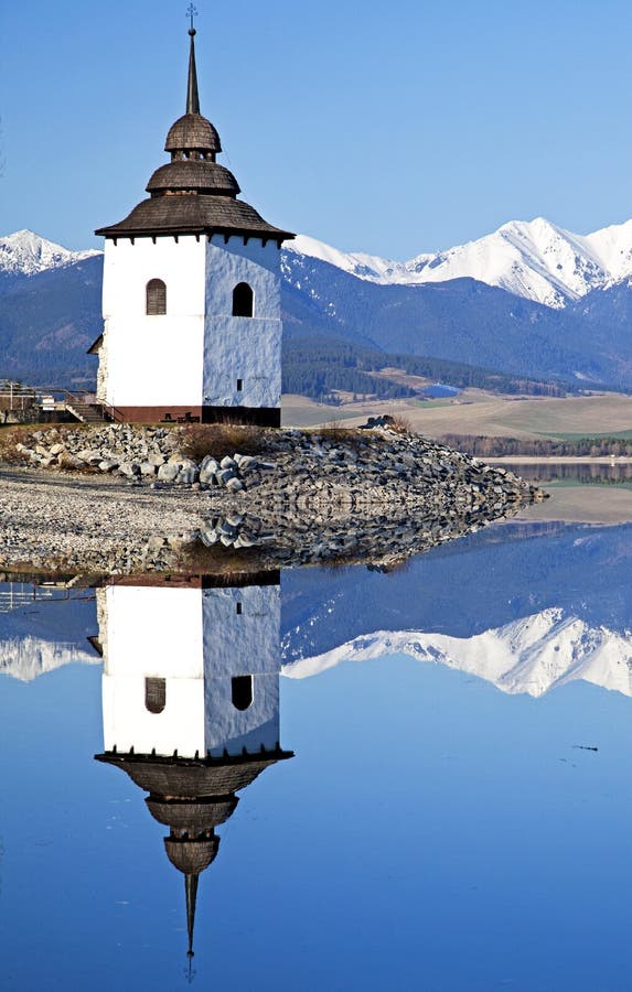 Old church tower near water basin Liptovska Mara