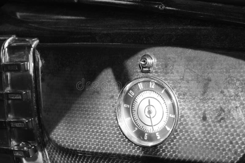 Old clock on american car glove box