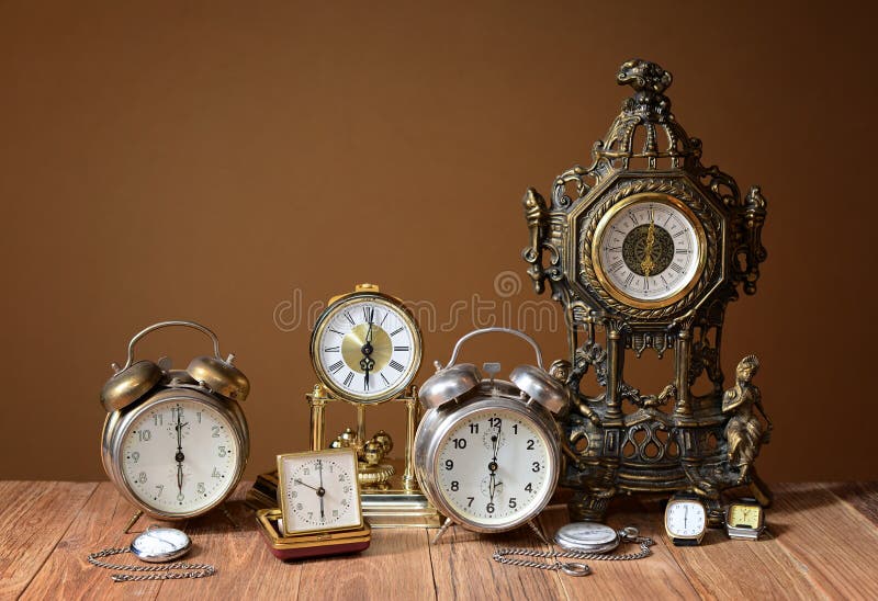 Old clocks, alarm clocks and handheld clocks