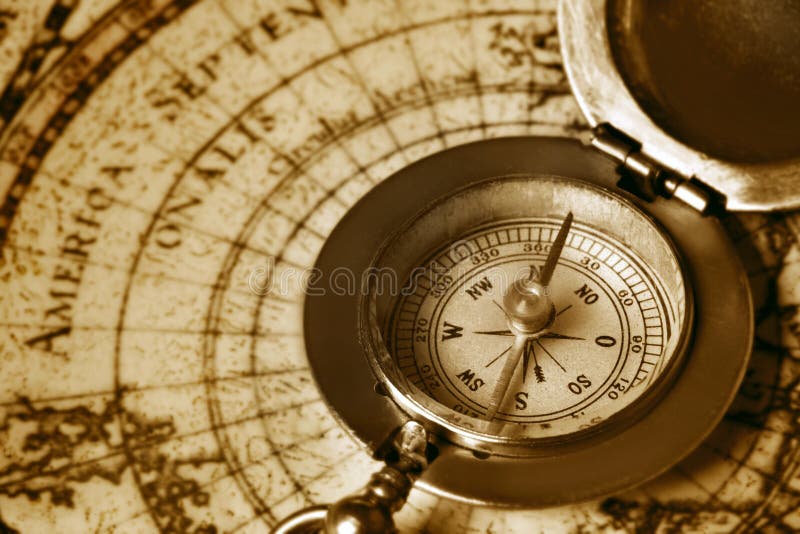 Old compass on vintage map royalty free stock photos Old compass on vintage map royalty free stock photos