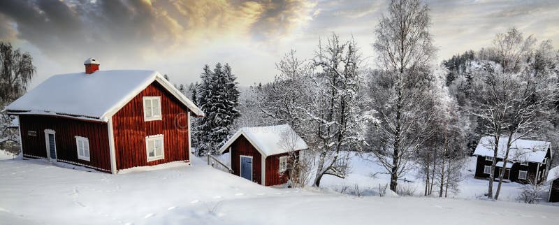 Old cottages in a snowy winter landscape